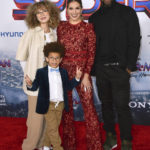 
              FILE - Weslie Fowler, from left, Maddox Laurel Boss, Allison Holker, and Stephen "tWitch" Boss appear at the premiere of "Spider-Man: No Way Home" on Dec. 13, 2021, in Los Angeles. Stephen Boss, a longtime DJ and co-executive producer on the talk show “The Ellen DeGeneres Show” and former contestant on the dance competition show, “So You Can Think You Can Dance” has died at the age of 40. (Photo by Jordan Strauss/Invision/AP, File)
            