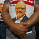 
              FILE - People hold posters of slain Saudi journalist Jamal Khashoggi, near the Saudi Arabia consulate in Istanbul, on Oct. 2, 2020. A federal judge dismissed a U.S. lawsuit against Saudi Crown Prince Mohammed bin Salman in the Saudi killing of U.S.-based journalist Jamal Khashoggi on Tuesday, Dec. 6, 2022, bowing to the Biden administration's insistence that the prince was legally immune in the case.(AP Photo/Emrah Gurel, File)
            