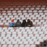 
              Football fans watch pregame warmups before an NFL football game between the Cleveland Browns and the New Orleans Saints, Saturday, Dec. 24, 2022, in Cleveland. (AP Photo/Ron Schwane)
            
