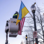 
              U.S. and Ukrainian flags are put in place along Pennsylvania Ave., Wednesday, Dec. 21, 2022, ahead of a visit from Ukraine President Volodymyr Zelenskyy in Washington, near the U.S. Capitol. (AP Photo/Jacquelyn Martin)
            