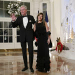 
              New Jersey Gov. Phil Murphy and his wife Tammy Murphy arrive for the State Dinner with President Joe Biden and French President Emmanuel Macron at the White House in Washington, Thursday, Dec. 1, 2022. (AP Photo/Susan Walsh)
            