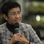
              Journalist Maria Ressa, one of the winners of the 2021 Nobel Peace Prize, answers questions during the book launch for her book "How to Stand Up to a Dictator: The Fight for Our Future, " in metropolitan Manila, Philippines that coincides with International Human Rights Day, Saturday, Dec. 10, 2022. The co-founder of local news website Rappler faces a string of criminal charges filed by former President Rodrigo Duterte’s administration and his allies that are related to Rappler’s coverage of the killings in the war on drugs and alleged government-sponsored disinformation networks. (AP Photo/Aaron Favila)
            