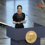 
              Oleksandra Matviychuk of Ukraine's Center for Civil Liberties, speaks during the Nobel Peace Prize ceremony at Oslo City Hall, Norway, Saturday, Dec. 10, 2022. The winners of this year’s Nobel Peace Prize from Ukraine, Russia and Belarus have shared their visions of a fairer world during an award ceremony and denounced Russian President Vladimir Putin’s war in Ukraine. (AP Photo/Markus Schreiber)
            