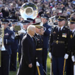 
              President Joe Biden and French President Emmanuel Macron review the troops with Col. David Rowland, commander of the 3rd U.S. Infantry Regiment, The Old Guard, during a State Arrival Ceremony on the South Lawn of the White House in Washington, Thursday, Dec. 1, 2022. (AP Photo/Alex Brandon)
            