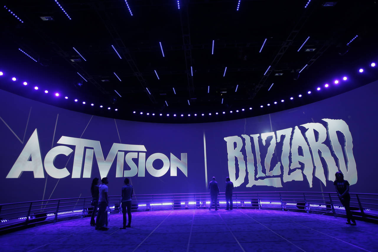 FILE - The Activision Blizzard Booth during the Electronic Entertainment Expo in Los Angeles, June ...