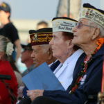 
              Pearl Harbor survivors and other military veterans observe a ceremony on Wednesday, Dec . 7, 2022 in Pearl Harbor, Hawaii in remembrance of those killed in the 1941 attack. A handful of centenarian survivors of the attack on Pearl Harbor gathered at the scene of the Japanese bombing on Wednesday to commemorate those who perished 81 years ago. (AP Photo/Audrey McAvoy)
            
