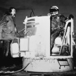 
              FILE - In this photo provided by the U.S. Air Force, Capt. Joseph Kittinger Jr., aerospace laboratory test director, sits in the open balloon gondola after his first parachute test jump for Project Excelsior at the Air Force Missile Development Center, N.M., Nov. 16, 1959. The gondola carried him at an altitude of 76,400 feet for his record free fall jump of more than 12 miles. At left is David Willard, who designed and developed special equipment for the gondola. Kittinger, the U.S. Air Force pilot who held the record for the highest parachute jump for more than 50 years, died Friday, Dec. 9, 2022, in Florida at age 94. (AP Photo/File)
            
