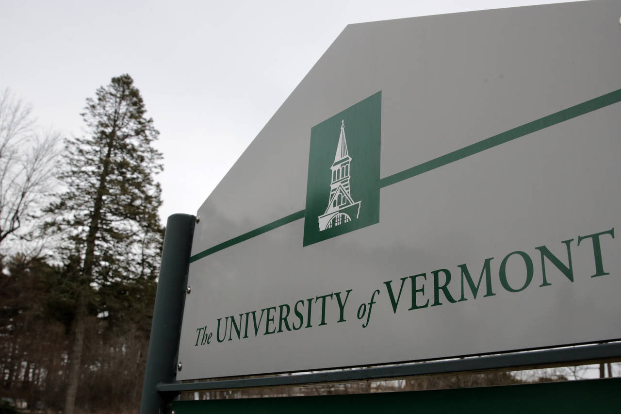 FILE - A sign on the University of Vermont campus in Burlington, Vt., is pictured on March 11, 2020...