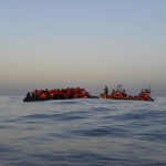 
              A MSF, Doctors Without Borders, humanitarian organization rescue team approaches a rubber boat with 74 migrants on board to transfer them to their rescue ship Geo Barents, in the Mediterranean Sea, Sunday, Dec. 4, 2022. MSF in one of two aid groups that rescued more than 500 people from the Mediterranean in the last days and are seeking a port where they can disembark their passengers, posing a new challenge to the Italian government which has vowed to crack down on migrant smuggling operations in north Africa. (Candida Lobes/MSF Via AP)
            