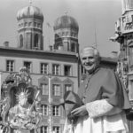 
              FILE - Cardinal Joseph Ratzinger, with the towers of Munich's cathedral in the background, bids farewell to Bavarian believers in downtown Munich, Germany, on Feb. 28, 1982, before heading to Rome to lead the Congregation for the Doctrine of the Faith at the Vatican. Cardinal Ratzinger went on to become Pope Benedict XVI. Pope Emeritus Benedict XVI, the German theologian who will be remembered as the first pope in 600 years to resign, has died, the Vatican announced Saturday. He was 95.  (AP Photo/Dieter Endlicher, File)
            