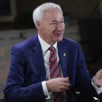 
              Arkansas Governor Asa Hutchinson responding during an interview with Andrew DeMillo of the Associated Press, Tuesday, Dec. 13, 2022 in Washington. (AP Photo/Pablo Martinez Monsivais)
            