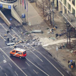 
              Debris lay in front of a hotel in Berlin, Germany, Friday, Dec. 16, 2022. German police say a huge fish tank in the center of Berlin has burst, causing a wave of devastation in and around the Sea Life tourist attraction. (Christoph Soeder/dpa via AP)
            