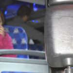 
              This image provided by WJLA shows migrant families on a bus near the Vice President's residence after they arrived in Washington, Saturday, Dec. 24, 2022. Local organizers in Washington say three buses of recent migrant families arrived from Texas near the home in record-setting cold on Christmas Eve. Texas authorities have not confirmed their involvement. (WJLA via AP)
            