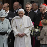
              FILE - Britain's Queen Elizabeth II, left, accompanies Pope Benedict XVI as he leaves the Palace of Holyroodhouse in Edinburgh, Scotland, on Sept. 16, 2010. Pope Emeritus Benedict XVI, the German theologian who will be remembered as the first pope in 600 years to resign, has died, the Vatican announced Saturday. He was 95. (AP Photo/Lefteris Pitarakis, pool, File)
            