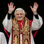 
              FILE - Pope Benedict XVI greets the crowd from the central balcony of St. Peter's Basilica at the Vatican, on Tuesday, April 19, 2005, soon after his election. When Cardinal Joseph Ratzinger became Pope Benedict XVI and was thrust into the footsteps of his beloved and charismatic predecessor, he said he felt a guillotine had come down on him. The Vatican announced Saturday Dec. 31, 2022 that Benedict, the former Joseph Ratzinger, had died at age 95. (AP Photo/Andrew Medichini, File)
            
