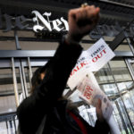 
              Hundreds of New York Times journalists and other staff protest outside the Times' office after walking off the job for 24 hours, frustrated by contract negotiations that have dragged on for months in the newspaper's biggest labor dispute in more than 40 years, Thursday, Dec. 8, 2022, in New York. (AP Photo/Julia Nikhinson)
            