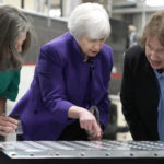 Secretary of the Treasury Janet Yellen, center, and Treasurer of the United States Chief Lynn Malerba, left,  inspect printing plates with Deputy Director Charlene Williams during a visit to the Bureau of Engraving and Printing's (BEP) Western Currency Facility in Fort Worth, Texas, Thursday, Dec. 8, 2022. Yellen unveiled the first U.S. currency bearing her signature, marking the first time that U.S. bank notes will bear the name of a female treasury secretary. (AP Photo/LM Otero)