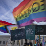 
              People on both sides of the debate rally outside the Supreme Court in Washington, Monday, Dec. 5, 2022. The Supreme Court is hearing the case of a Christian graphic artist who objects to designing wedding websites for gay couples, that's the latest clash of religion and gay rights to land at the highest court. (AP Photo/Andrew Harnik)
            