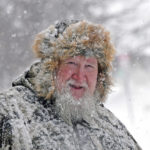 
              Mike Howarth is dressed for the winter weather while shopping in downtown Bismarck, N.D., on Wednesday, Dec. 14, 2022. (Tom Stromme/The Bismarck Tribune via AP)
            