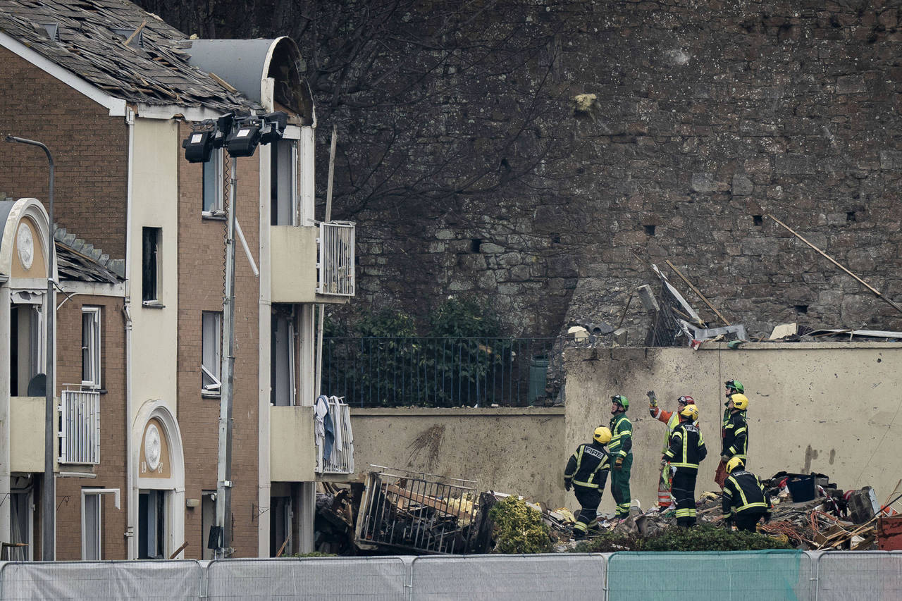 Specialist rescue teams at the scene of an explosion and fire at an apartment building, in St Helie...