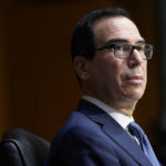 
              FILE - Treasury Secretary Steven Mnuchin testifies before the Senate Banking Committee on Capitol Hill in Washington, Dec. 1, 2020, during a hearing on, 'The Quarterly CARES Act Report to Congress.' (AP Photo/Susan Walsh, Pool, File)
            
