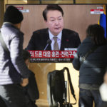 
              A TV screen shows a news program reporting about South Korean President Yoon Suk Yeol speaking during a cabinet council meeting,  at the Seoul Railway Station in Seoul, South Korea, Tuesday, Dec. 27, 2022. President Yoon on Tuesday called for a stronger air defense and high-tech stealth drones to better monitor North Korea, a day after it accused five North Korea of flying drones across the rivals’ tense border for the first time in five years. (AP Photo/Lee Jin-man)
            