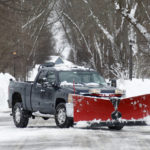 
              A plow clears snow after a winter storm rolled through Western New York Tuesday, Dec. 27, 2022, in Amherst, N.Y. (AP Photo/Jeffrey T. Barnes)
            