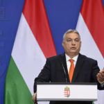 
              Hungarian Prime Minister Viktor Orban holds a year end international press conference at the government headquarters in Budapest, Hungary, Wednesday, Dec. 21, 2022. (Szilard Koszticsak/MTI via AP)
            