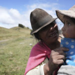 
              An Indigenous woman soothes her daughter before giving her a flu shot in Cotopaxi, Ecuador, Friday 2, 2022. Child malnutrition is chronic among Ecuador's 18 million inhabitants, hitting hardest in rural areas and among the country's Indigenous, according to Erwin Ronquillo, secretary of the government program Ecuador Grows Without Malnutrition. (AP Photo/Dolores Ochoa)
            