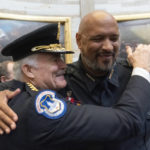 
              U.S. Capitol Police Chief Thomas Manger, left, hugs officer Sgt. Harry Dunn after a Congressional Gold Medal ceremony honoring law enforcement officers who defended the U.S. Capitol on Jan. 6, 2021, in the U.S. Capitol Rotunda in Washington, Tuesday, Dec. 6, 2022. (AP Photo/Alex Brandon)
            