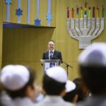 
              German Chancellor Olaf Scholz speaks during his visit at the Jewish Heinz-Galinski  elementary school, to mark the start of the Jewish Hanukkah holidays in Berlin, Germany, Monday, Dec. 19, 2022. Holocaust survivors from around the world are marking the third day of Hanukkah in a virtual ceremony online as Jews are worrying about a sharp increase in antisemitism in the U.S., Europe and elsewhere.(Bernd von Jutrczenka/dpa via AP)
            