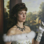 
              This image released by IFC Films shows Vicky Krieps as Empress Elisabeth in a scene from "Corsage." (IFC Films via AP)
            