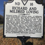 
              A highway marker stands for Richard and Mildred Loving on Thursday, Dec. 1, 2022, in Milford, Va. The interracial couple's legal challenge led to a 1967 U.S. Supreme Court ruling that struck down state laws banning marriages between people of different races. The Respect for Marriage Act enshrines interracial and same-sex marriages in federal law. (AP Photo/Denise Lavoie)
            