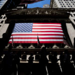 
              People walk past the New York Stock Exchange on Wednesday, June 29, 2022 in New York. Stocks are opening lower across the board on Wall Street, Tuesday, July 5, and crude oil prices are dropping again. Treasury yields also fell as traders continued to worry about the state of the economy (AP Photo/Julia Nikhinson)
            