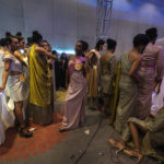
              Contestants wait to compete for the Miss Trans Northeast 22, beauty pageant in Guwahati, India, Wednesday, Nov. 30, 2022. In a celebration of gender diversity and creative expression, a beauty pageant in eastern Indian state of Assam brought dozens of transgender models on stage in Guwahati. Sexual minorities across India have gained a degree of acceptance especially in big cities and transgender people were given equal rights as a third gender in 2014. But prejudice against them persists and the community continues to face discrimination and rejection by their families. (AP Photo/Anupam Nath)
            