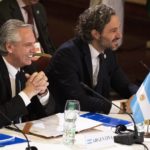 
              Argentina's President Alberto Fernandez, left, and his Minister of Foreign Affairs Santiago Cafiero attend the Mercosur trade bloc summit in Montevideo, Uruguay, Tuesday, Dec. 6, 2022. (AP Photo/Matilde Campodonico)
            