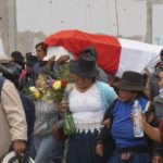 Relatives of a child who was killed during protests against new President Dina Boluarte carry his coffin to the cemetery in Andahuaylas, Peru, Monday, Dec. 12, 2022. Peru's Congress voted to remove Castillo from office the previous week and replace him with the vice president, Boluarte, shortly after Castillo tried to dissolve the legislature ahead of a scheduled vote to remove him. (AP Photo/Franklin Briceno)