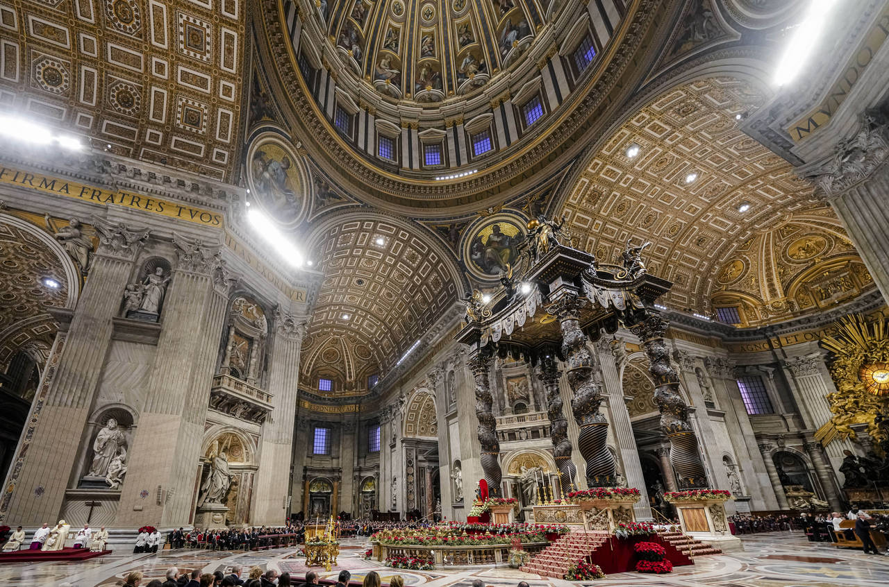 Pope Francis, sitting at left, presides over the first Vespers and the 'Te Deum' in St. Peter's Bas...