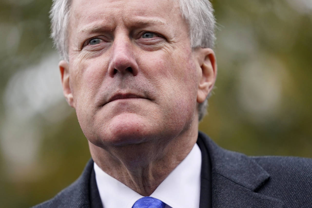 FILE - Then-White House chief of staff Mark Meadows speaks with reporters outside the White House, ...