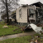 
              A house is seen damaged after a confirmed tornado on Friscoville Avenue in Arabi, La., in St. Bernard Parish, Wednesday, Dec. 14, 2022. (AP Photo/Matthew Hinton)
            