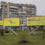 
              Newly placed Ukrainian billboard in Kherson, southern Ukraine, Nov. 27, 2022. From left, the billboard reads in Ukrainian: "Dear, you are Free" and "Kherson, Hero City". (AP Photo/Bernat Armangue)
            