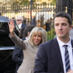 
              Brigitte Macron, wife of French President Emmanuel Macron, waves to crowds as they arrive at Jackson Square in New Orleans, Friday, Dec. 2, 2022. (AP Photo/Gerald Herbert)
            