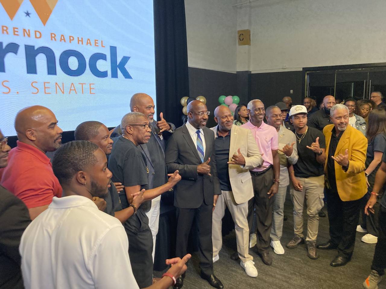 Georgia Sen. Raphael Warnock campaigns on Sept. 2, 2022, in Atlanta with other members of historica...