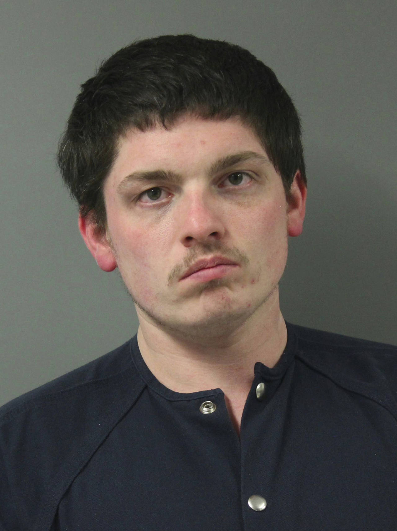 This undated photo provided by Webster County Jail in Iowa shows Brandon D. Thoma. Authorities said...