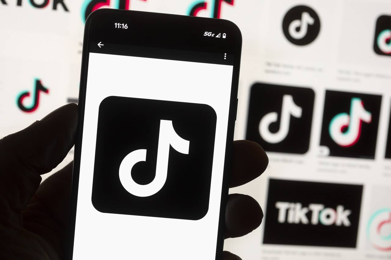 FILE - The TikTok logo is seen on a cell phone on Oct. 14, 2022, in Boston. Georgia Gov. Brian Kemp...