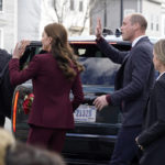 
              Britain's Prince William and Kate, Princess of Wales wave to onlookers following a visit to Greentown Labs, Thursday, Dec. 1, 2022, in Somerville, Mass. (AP Photo/Mary Schwalm)
            