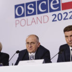 
              OSCE Secretary General Helga Maria Schmid, left, Polish Minister of Foreign Affairs Zbigniew Rau, center, and Minister of Foreign Affairs of North Macedonia Bujar Osmani, right, attend a press conference after a closing session of a high-level meeting of the Organization for Security and Cooperation in Europe in Lodz, Poland, Friday, Dec. 2, 2022. A security organization born in the Cold War to maintain peace in Europe ended a high-level meeting Friday without a final resolution, underlining the existential crisis it is facing amid Russia's war against Ukraine. (AP Photo/Michal Dyjuk)
            