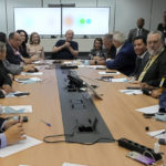 
              Brazilian President-elect Luiz Inacio Lula da Silva, top center, meets with union members at the his transition team's headquarters in Brasilia, Brazil, Thursday, Dec. 1, 2022. Da Silva will be sworn-in on Jan. 1. (AP Photo/Eraldo Peres)
            