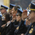 
              Law enforcement officers salute during the playing of the national anthem during a Congressional Gold Medal ceremony honoring law enforcement officers who defended the U.S. Capitol on Jan. 6, 2021, in the U.S. Capitol Rotunda in Washington, Tuesday, Dec. 6, 2022. (AP Photo/Alex Brandon)
            
