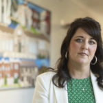 
              Amador County superintendent Torie Gibson poses in the hallway of the Amador County Office of Education in Jackson, Calif., Wednesday, Dec. 7, 2022. Gibson cancelled Amador High School's football season after learning the team had a group chat titled, 'Kill the Blacks,' filled with derogatory language and racial slurs. (AP Photo/José Luis Villegas)
            